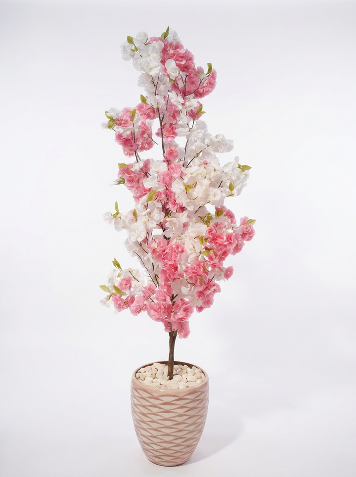 Artificial indoor plant on clean white studio background