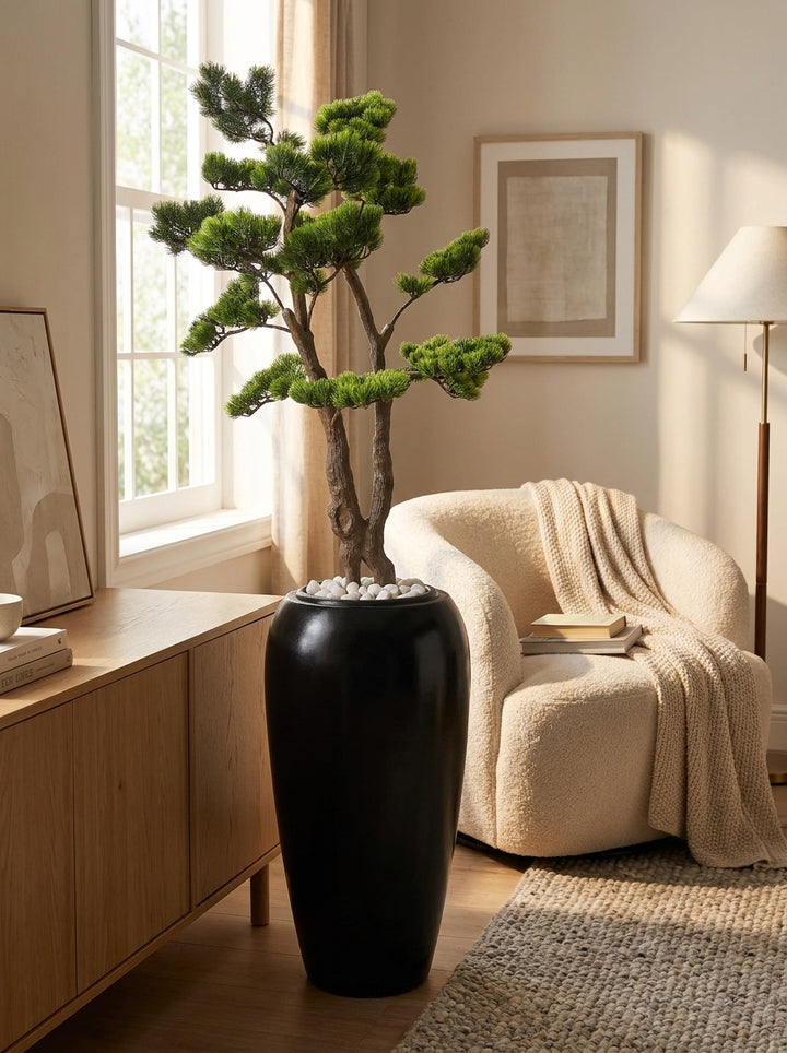 Artificial plant in designer pot styled in modern living room