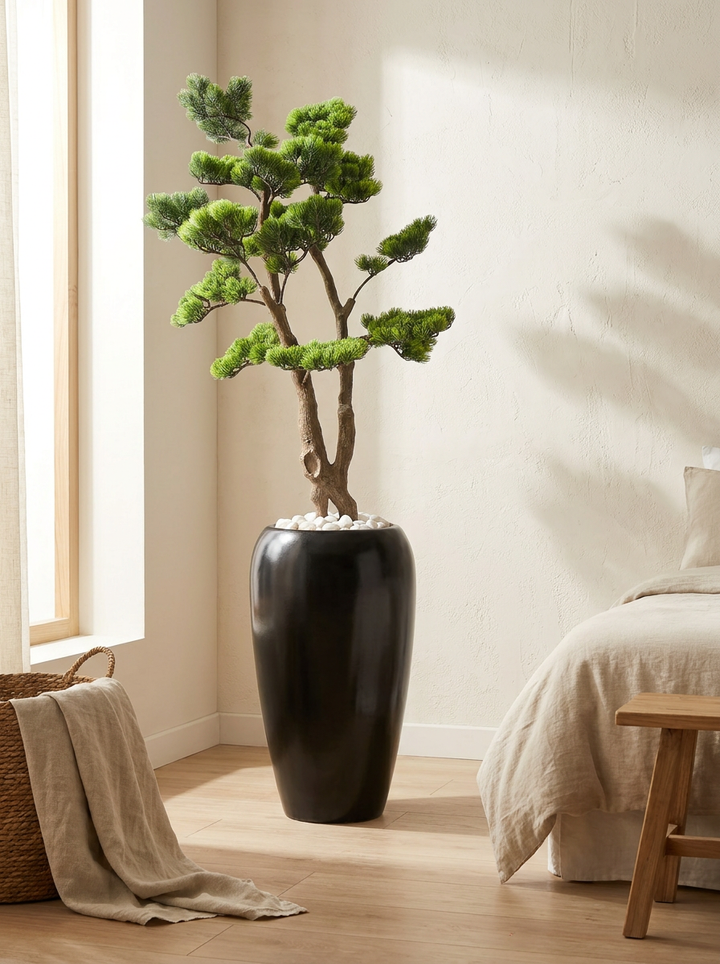Artificial plant in designer pot in minimalist bedroom corner
