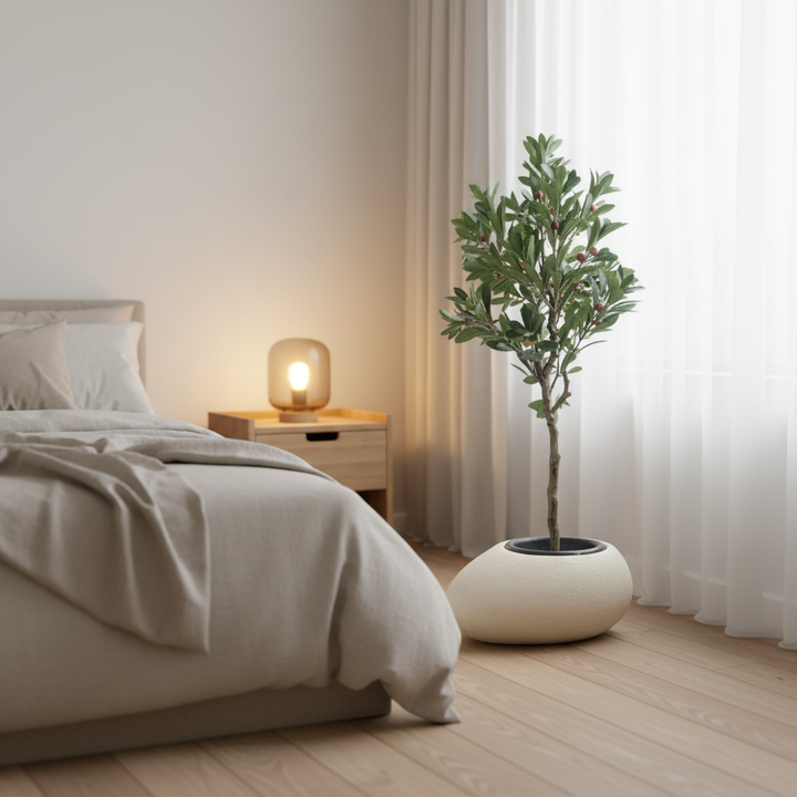 Artificial cherry tree in serene bedroom corner