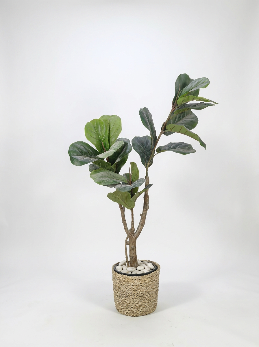 Artificial indoor plant on clean white studio background