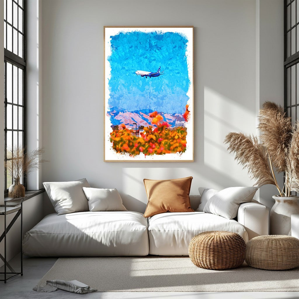 Wadi Home abstract airplane art with watercolor style, featuring a blue and white plane over a colorful landscape with orange and red hues.
