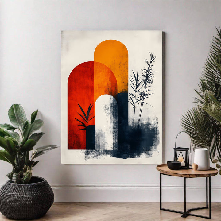 Wadi Home abstract arch botanical wall art with warm oranges, deep reds, navy blues, and plant silhouettes.