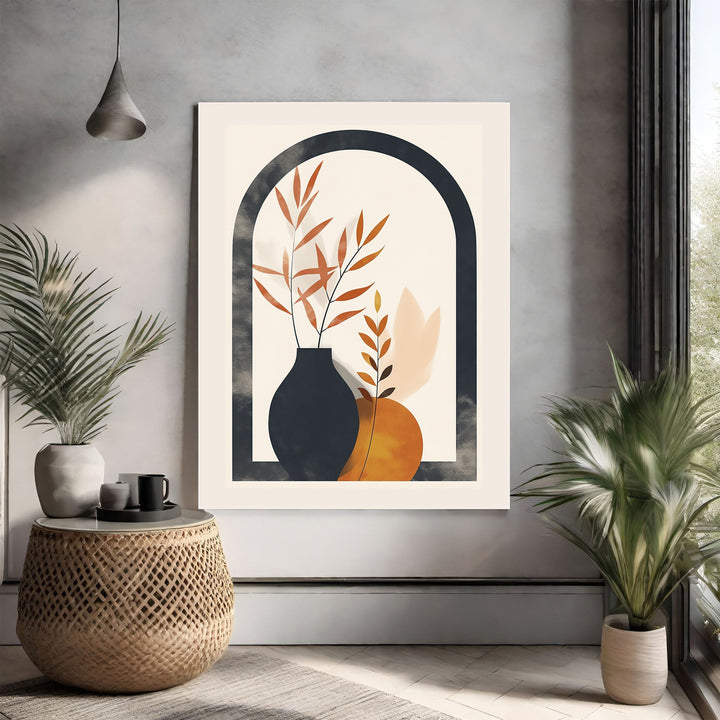 Wadi Home abstract botanical archway wall art with burnt orange leaves in a charcoal vase on a cream background.