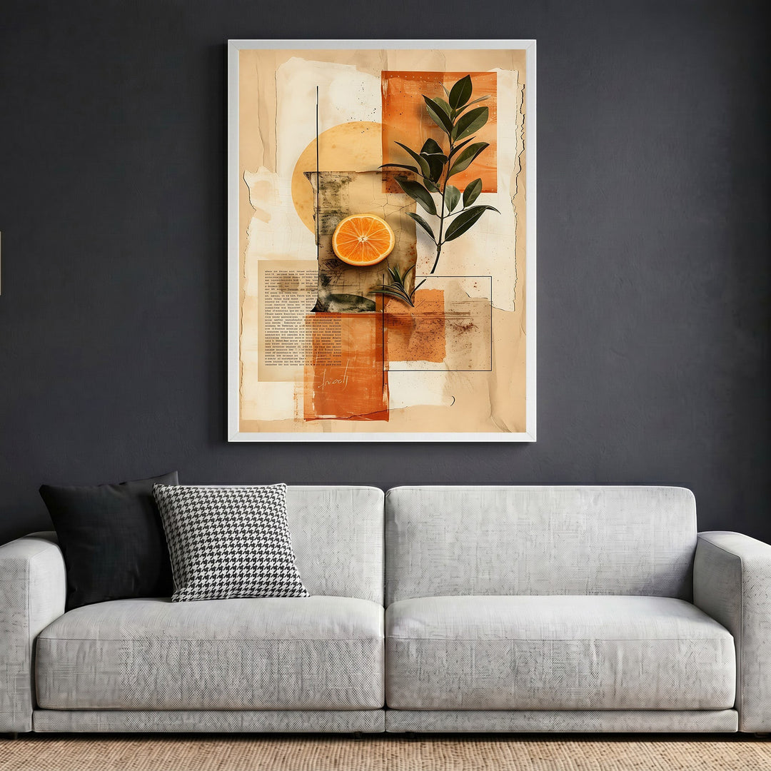 Wadi Home abstract botanical collage wall art featuring orange and foliage in a white frame above a modern sofa.