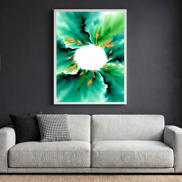Wadi Home abstract botanical wall art with emerald green watercolor and gold leaf accents in a white frame above a sofa.