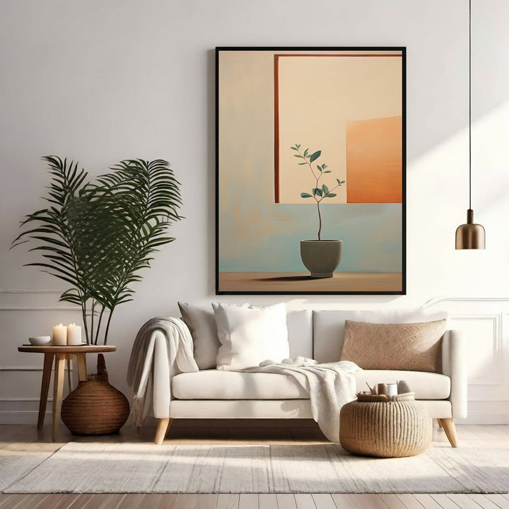 Wadi Home abstract botanical framed wall art with beige, terracotta, and blue tones, depicting a potted plant.