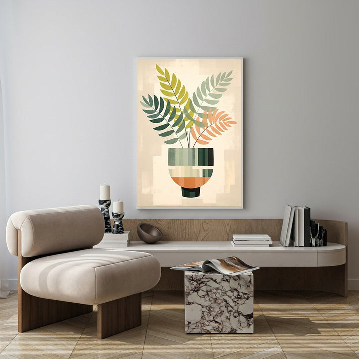 Wadi Home abstract botanical plant in a vase wall art with green, orange, and cream leaves and a geometric vase.