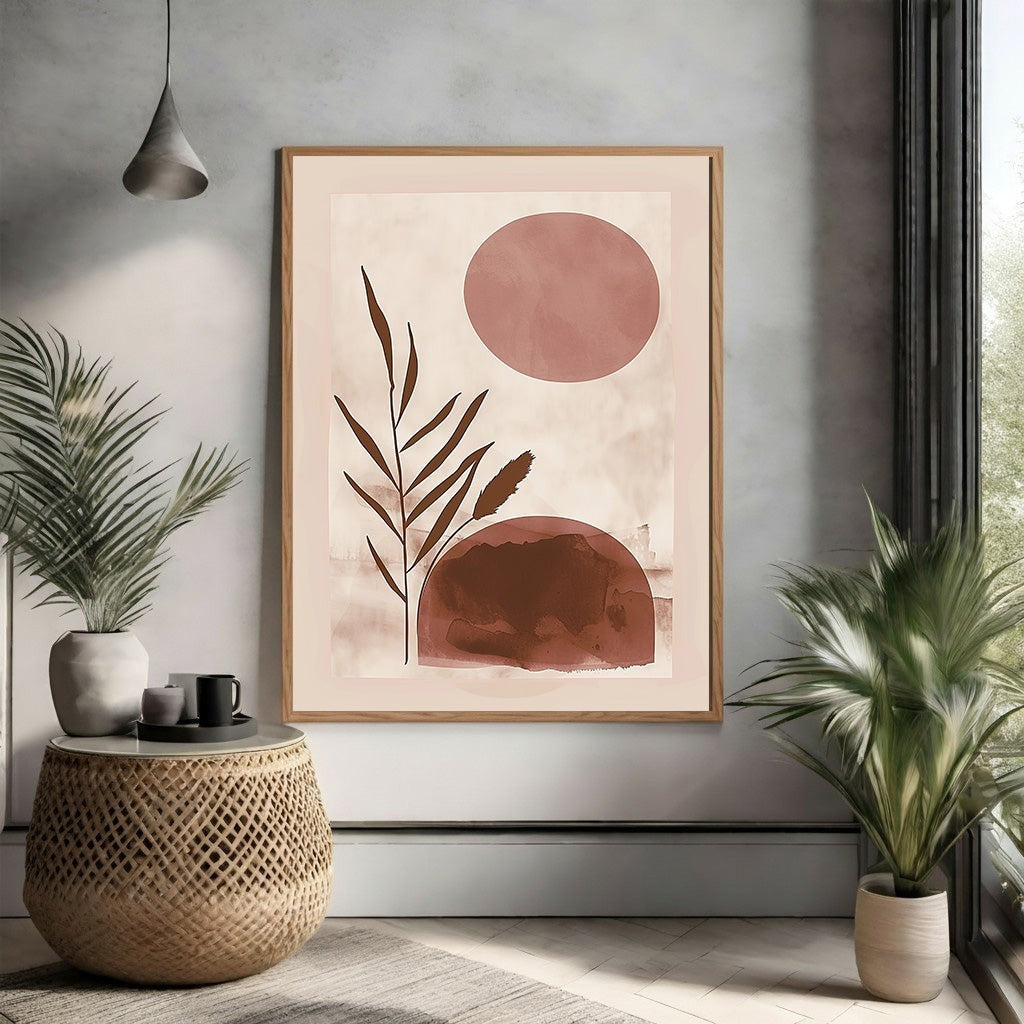 Wadi Home abstract botanical sunburst wall art in earthy tones with minimalist design. Features a pink sun, brown abstract shapes, and a botanical branch.
