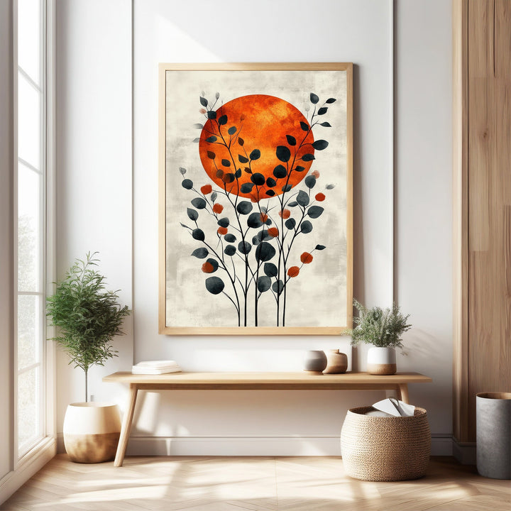 Wadi Home abstract botanical sunburst wall art with orange sun and dark blue leaves.