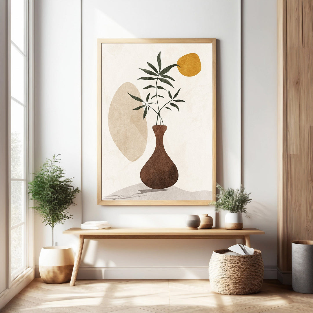 Wadi Home abstract botanical wall art featuring a brown vase with green leaves and a yellow circle on a textured neutral background.