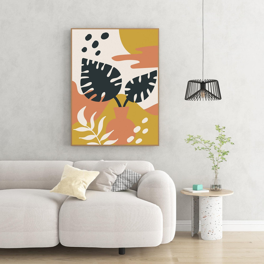 Wadi Home abstract botanical wall art with monstera leaves in ochre, terracotta, and deep green.
