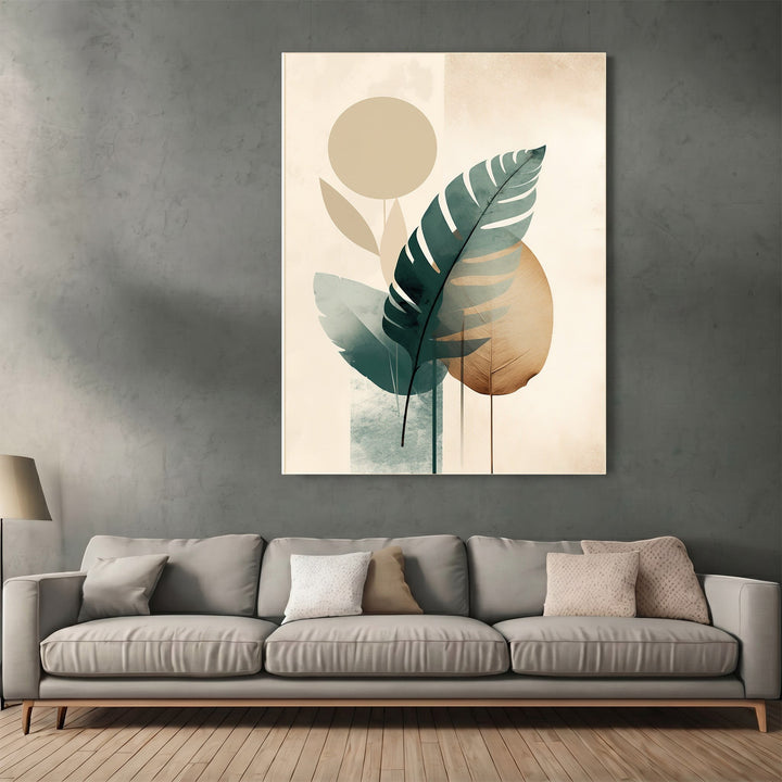 Wadi Home abstract botanical wall art print with forest green leaves and geometric shapes above a modern grey sofa.