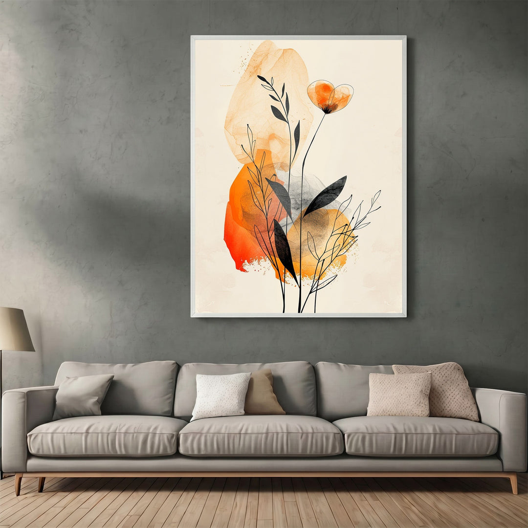 Wadi Home abstract botanical wall art print with amber and charcoal watercolor flora above a modern grey sofa.