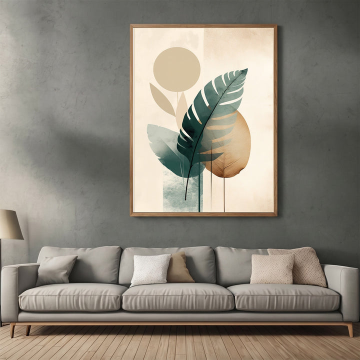 Wadi Home abstract botanical wall art print with tropical leaves and geometric shapes in earth tones above a grey sofa.