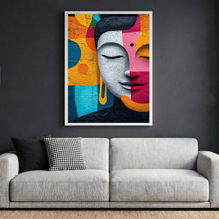 Wadi Home abstract Buddha face wall art print with vibrant orange, magenta, and teal geometric patterns above a sofa.