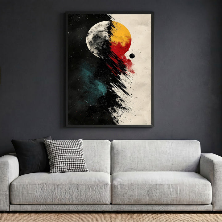 Wadi Home abstract celestial wall art print featuring a cosmic eclipse with black, red, and gold tones above a sofa.