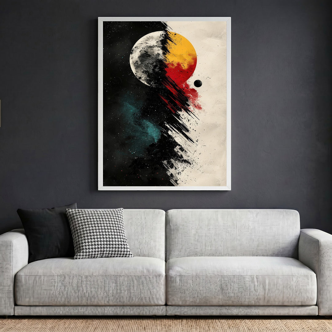 Wadi Home abstract celestial wall art print featuring a cosmic eclipse in black, red, and gold above a grey sofa.