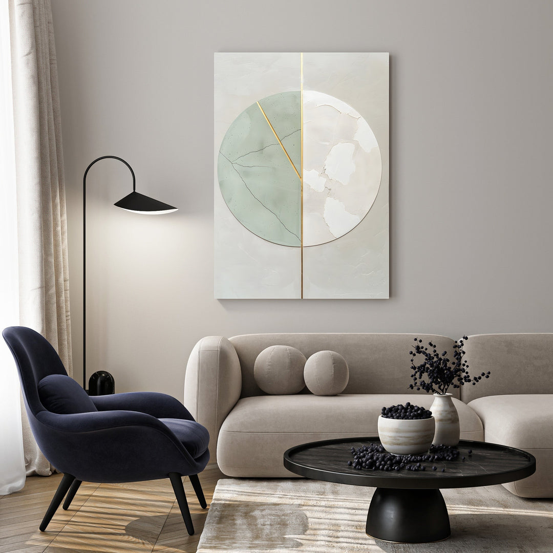 Wadi Home abstract circle canvas art with sage green, beige, and gold details, framed and hung above a sofa.