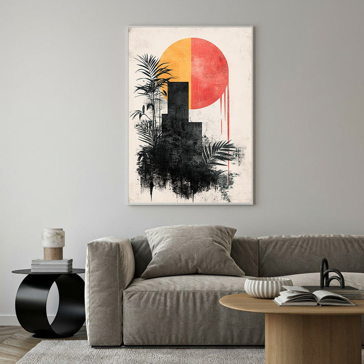 Wadi Home abstract cityscape botanical wall art with black silhouette buildings, palm leaves, and a split orange and red sun.