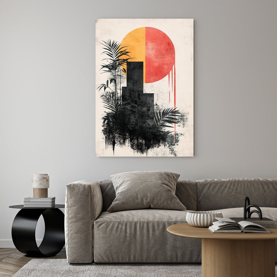 Wadi Home abstract cityscape botanical wall art with black silhouette buildings, palm leaves, and a split orange and red sun.