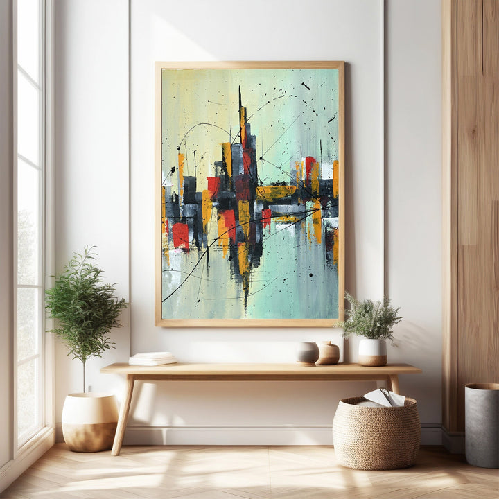 Wadi Home abstract cityscape canvas art with reds, yellows, blacks, and blues. Textured finish, modern design.