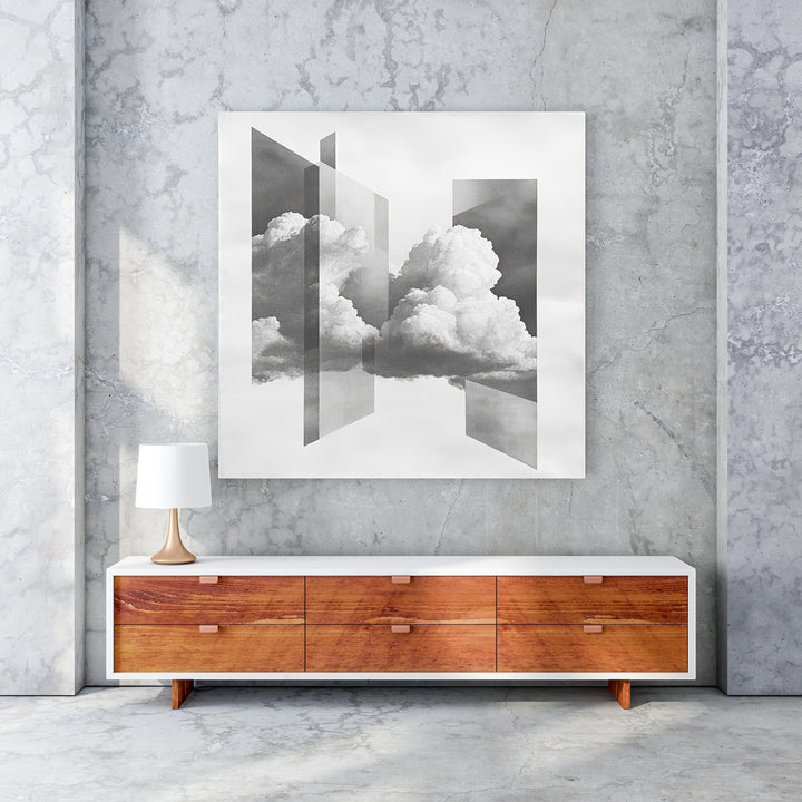 Wadi Home abstract cloudscape framed wall art with geometric shapes and monochromatic clouds.