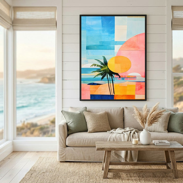 Wadi Home abstract coastal landscape wall art with palm tree silhouette in blue, pink, and yellow above a beige sofa.