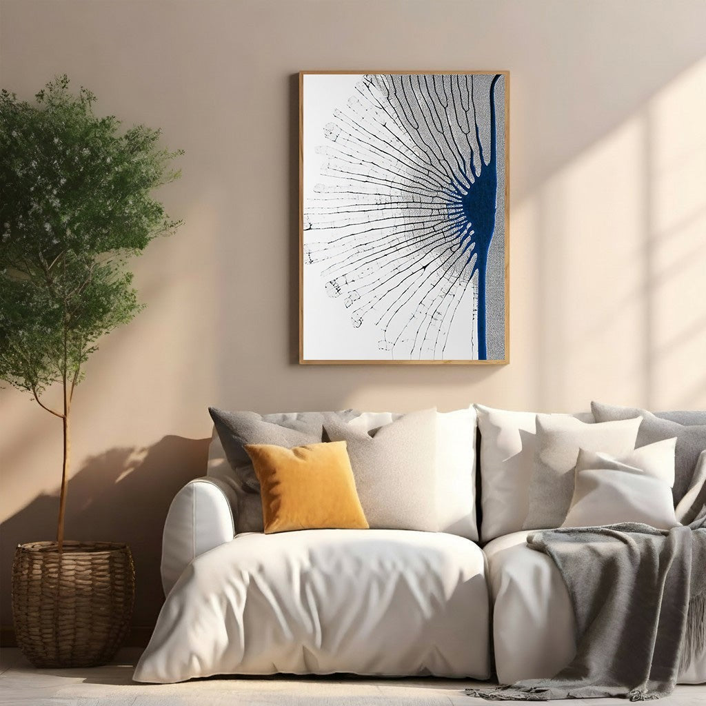 Wadi Home Abstract Dandelion Artwork in black, white, and blue. Delicate seed head design on a white background.