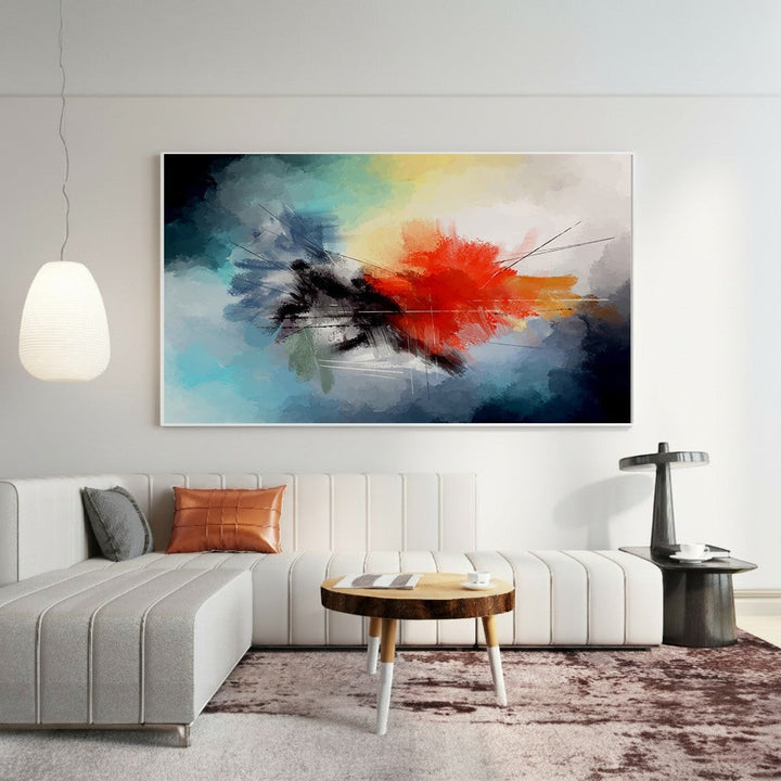 Wadi Home abstract expressionist canvas print with bold blue and red brushstrokes hanging above a modern white sofa.