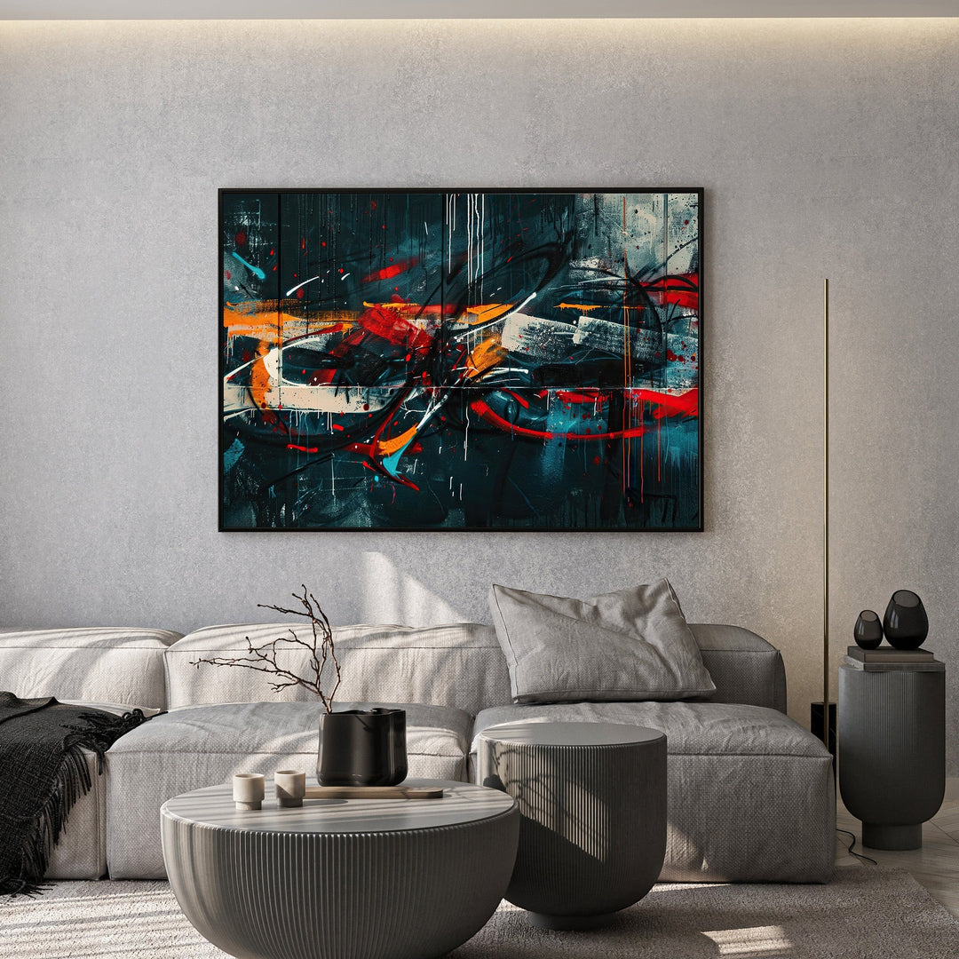 Wadi Home abstract expressionist framed wall art with moody tones and vibrant red and orange accents in a modern living room