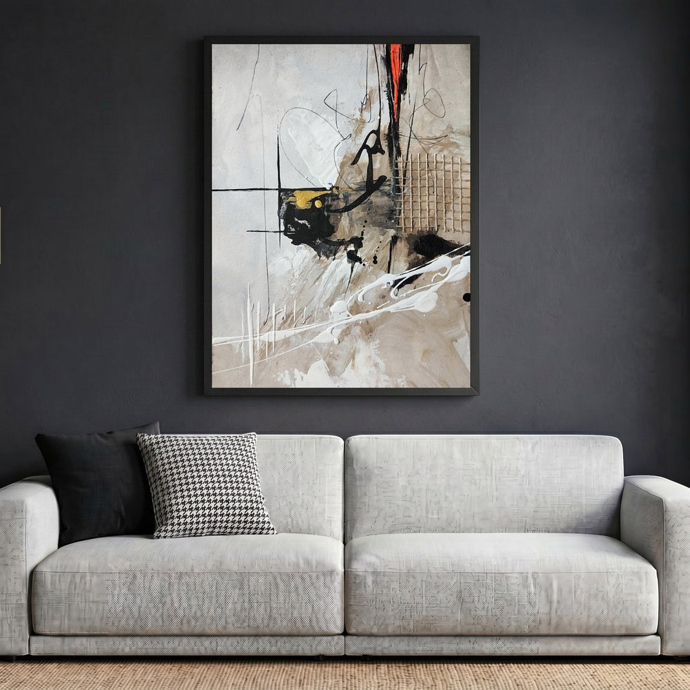 Wadi Home abstract expressionist framed wall art with neutral tones, black, gold, and red accents above a modern sofa.