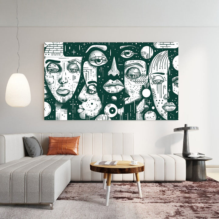 Wadi Home abstract wall art featuring stylized faces in dark green and white, displayed above a modern sofa.