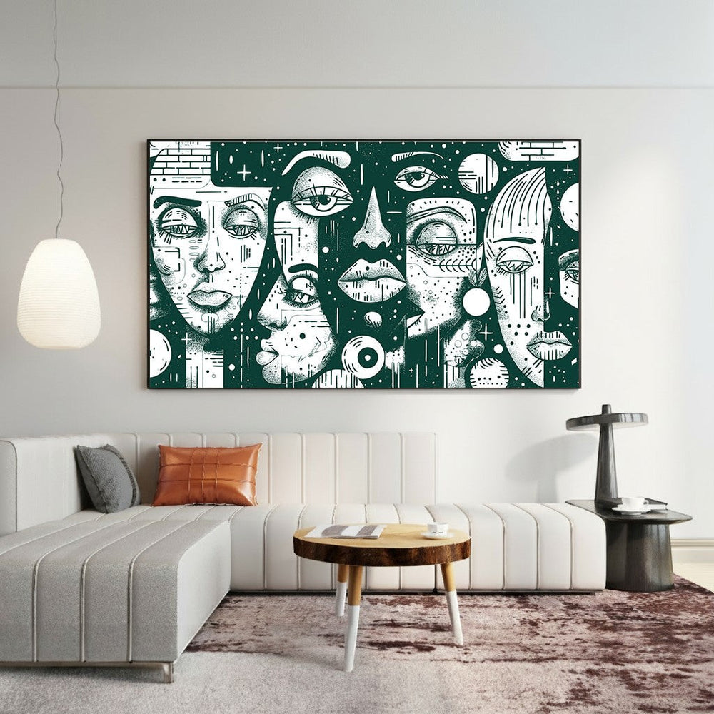 Wadi Home abstract wall art featuring stylized faces in black and white, displayed above a modern white sofa.