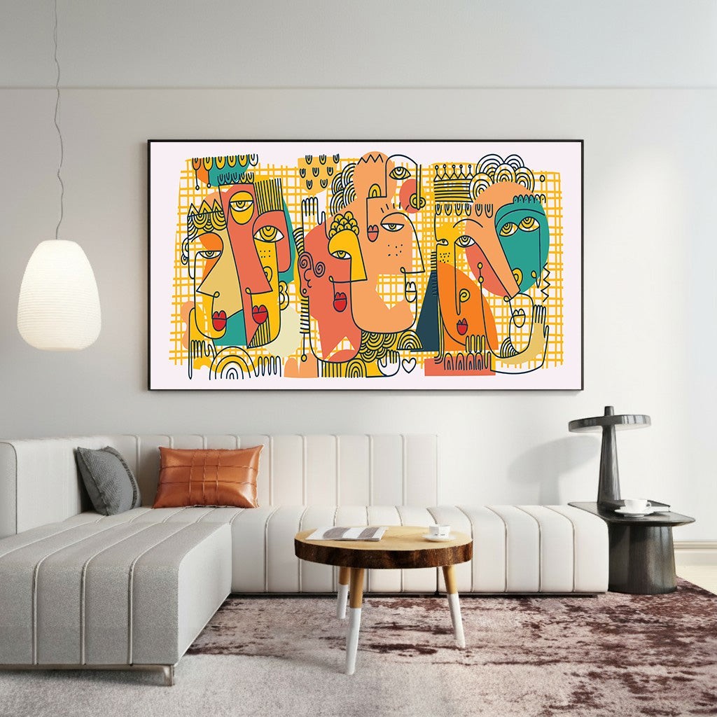 Wadi Home abstract faces canvas print with teal, orange, and yellow geometric art hanging above a modern white sofa.