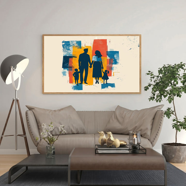 Wadi Home abstract family silhouette wall art with blue, yellow, and red paint strokes. Features a family of four holding hands.