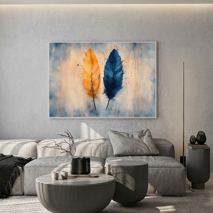 Wadi Home abstract feather canvas print with golden-yellow and navy-blue watercolor feathers in a modern living room