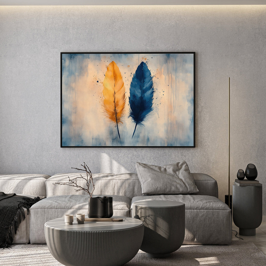Wadi Home abstract feather canvas print with golden-yellow and navy-blue watercolor feathers in a modern living room.