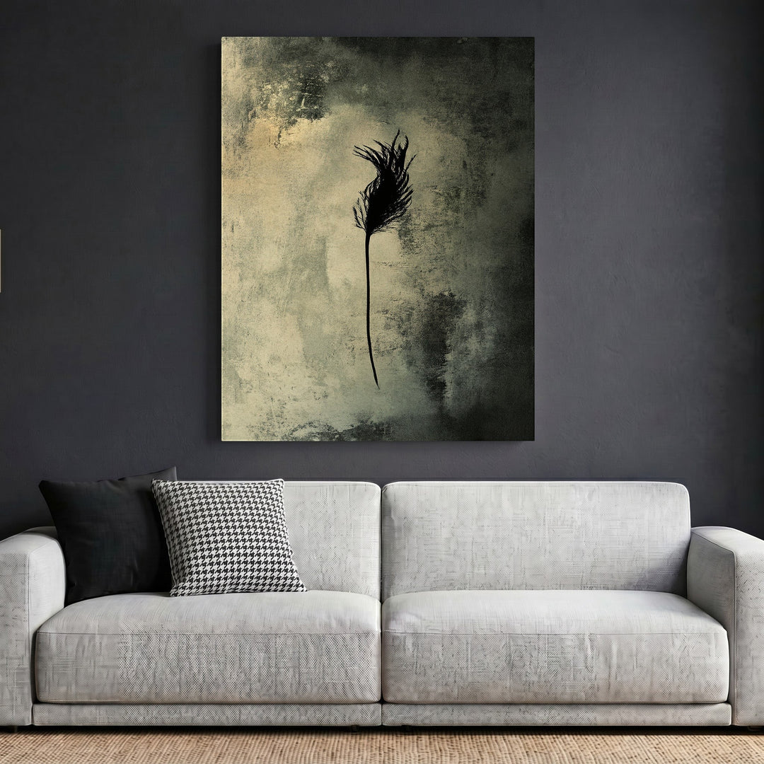 Wadi Home abstract feather wall art print with earthy tones and distressed texture hanging above a modern sofa