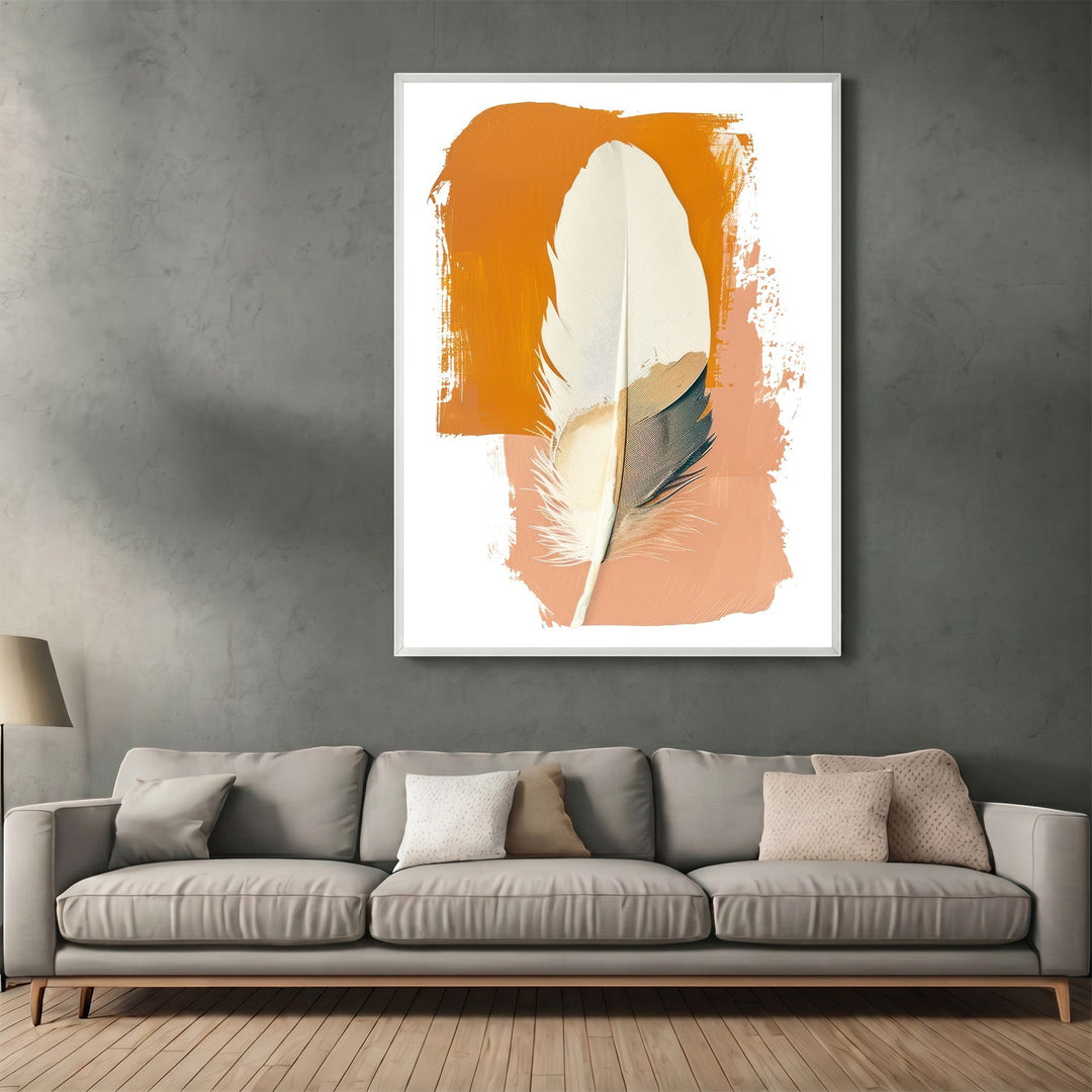 Wadi Home abstract feather wall art print with burnt orange and terracotta brushstrokes above a modern grey sofa.