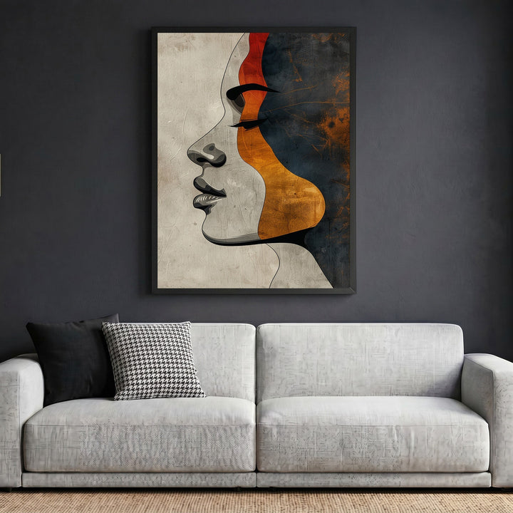 Wadi Home abstract female profile wall art print with terracotta, charcoal, and ochre accents in a modern living room.