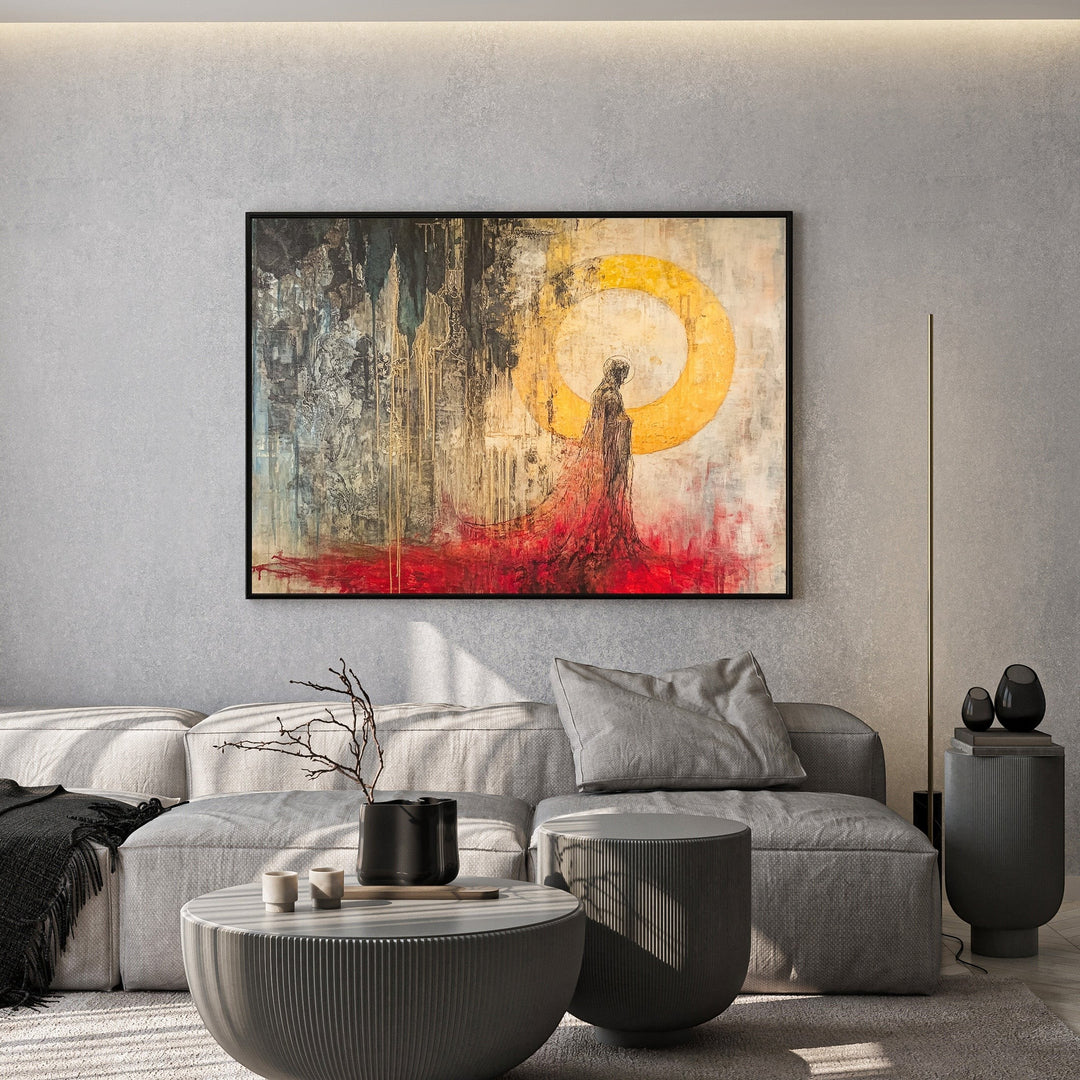 Wadi Home abstract figure canvas print with golden sun and crimson accents hanging above a modern grey sofa