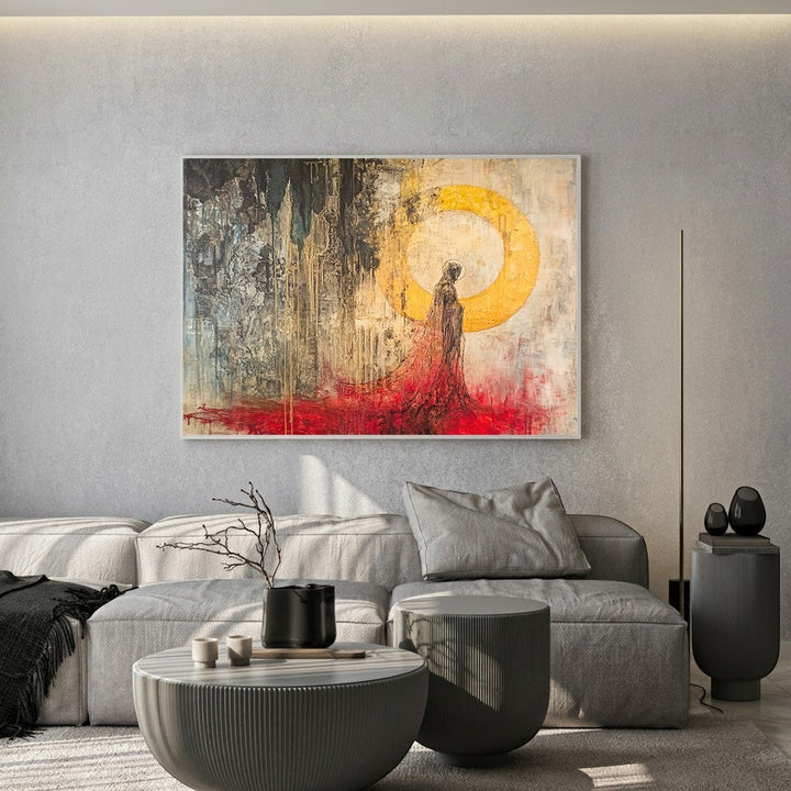 Wadi Home abstract figure canvas print with golden sun and crimson accents displayed above a modern grey sofa.
