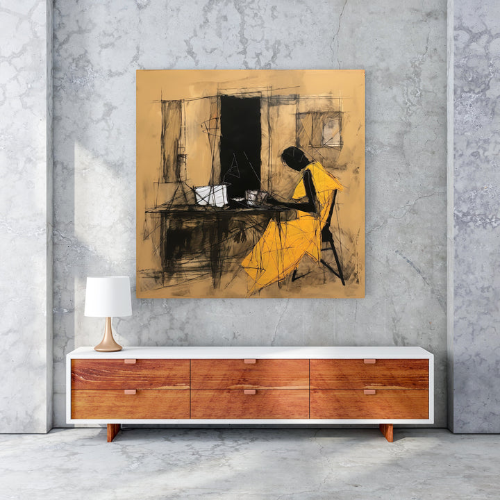 Wadi Home abstract wall art of a seated figure in a yellow dress, charcoal sketch on tan background.