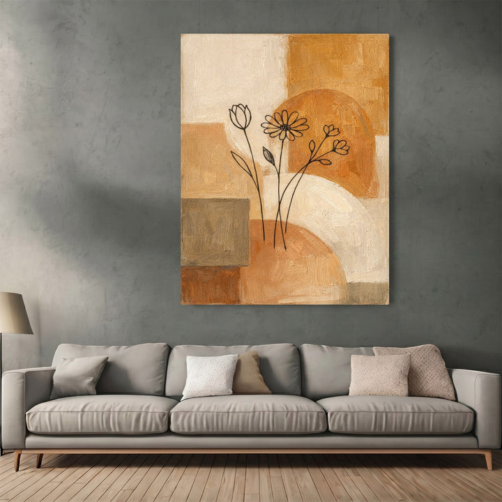 Wadi Home abstract floral canvas print with ochre, cream, and terracotta geometric shapes above a modern grey sofa.