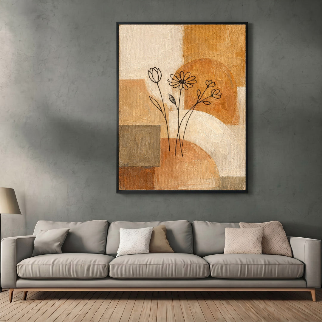 Wadi Home abstract floral canvas print with ochre, cream, and terracotta geometric shapes hanging above a grey sofa.