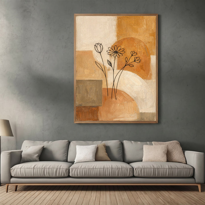 Wadi Home abstract floral canvas print with ochre, cream, and terracotta geometric shapes above a modern grey sofa.