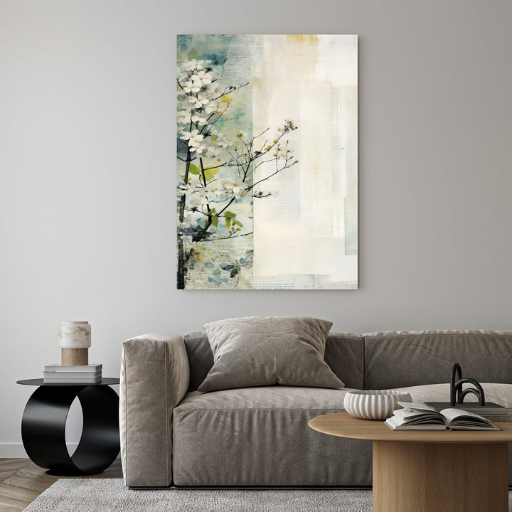 Wadi Home abstract floral branch wall art with white blossoms on textured mixed-media background in blues, creams, and yellows.