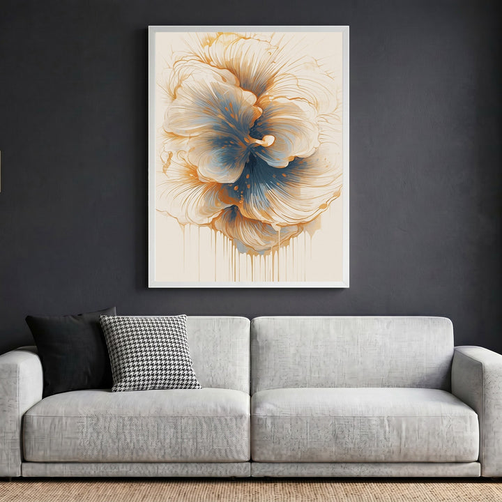 Wadi Home abstract floral wall art print with cream, blue, and amber tones in a white frame above a modern sofa.