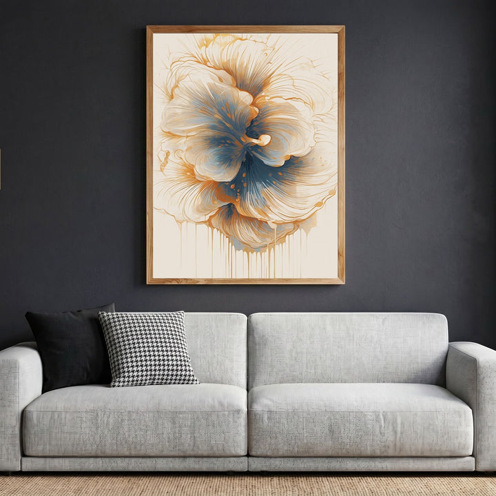 Wadi Home abstract floral wall art print with cream, blue, and amber tones in a wooden frame above a modern sofa.